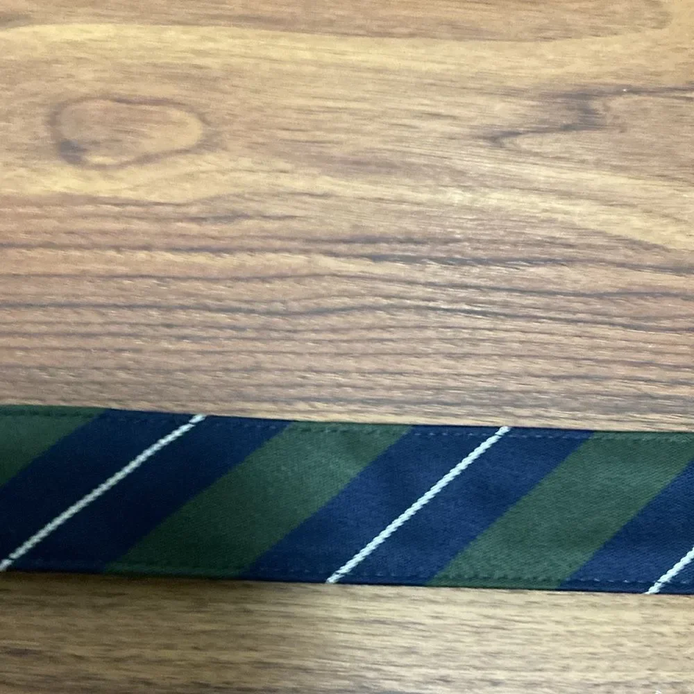 FH Wadsworth Men’s Leather Tab Belt in Blue/Green Tartan Stripe.